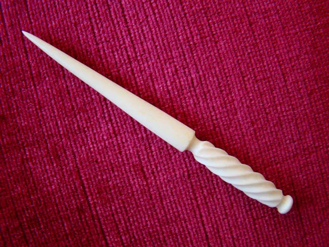 A fine 19th century sailor-made whale ivory bodkin with 'barley twist' handle